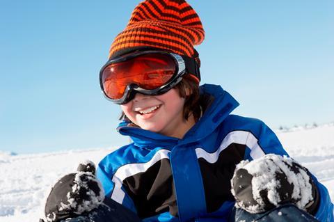 Boy snowboarding